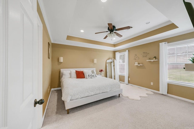 41 Winners Cir, Cabot, AR 72023 - carpeted bedroom featuring a raised ceiling, baseboards, recessed lighting, crown molding, and a ceiling fan