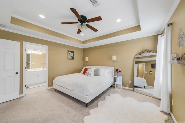 41 Winners Cir, Cabot, AR 72023 - carpeted bedroom featuring a raised ceiling, ornamental molding, recessed lighting, ensuite bathroom, and baseboards