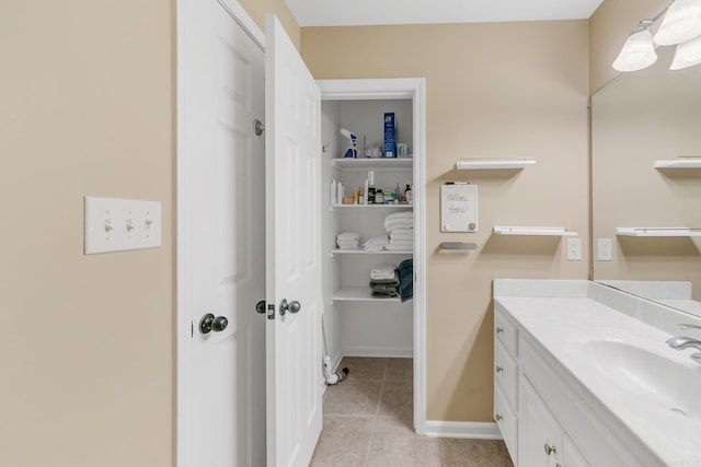 41 Winners Cir, Cabot, AR 72023 - bathroom featuring tile patterned floors, vanity, and baseboards
