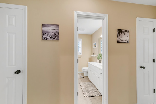 41 Winners Cir, Cabot, AR 72023 - bathroom with tile patterned flooring, toilet, vanity, and baseboards