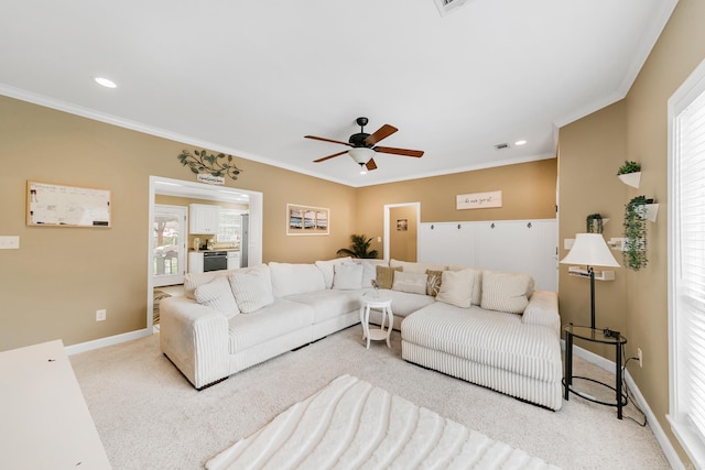 41 Winners Cir, Cabot, AR 72023 - living room featuring crown molding, light carpet, ceiling fan, baseboards, and recessed lighting