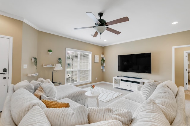 41 Winners Cir, Cabot, AR 72023 - living room featuring a ceiling fan, baseboards, light colored carpet, ornamental molding, and recessed lighting