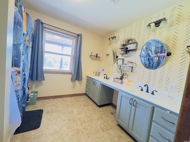 482 Ash Trl, Melbourne, AR 72556 - bathroom featuring double vanity and baseboards