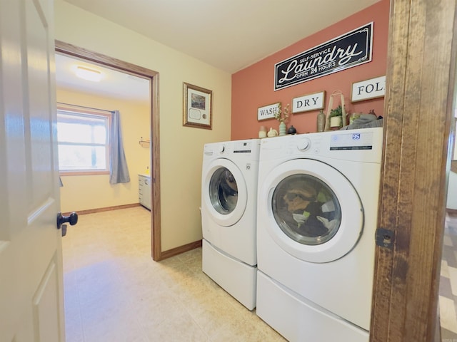 482 Ash Trl, Melbourne, AR 72556 - laundry area with separate washer and dryer and baseboards