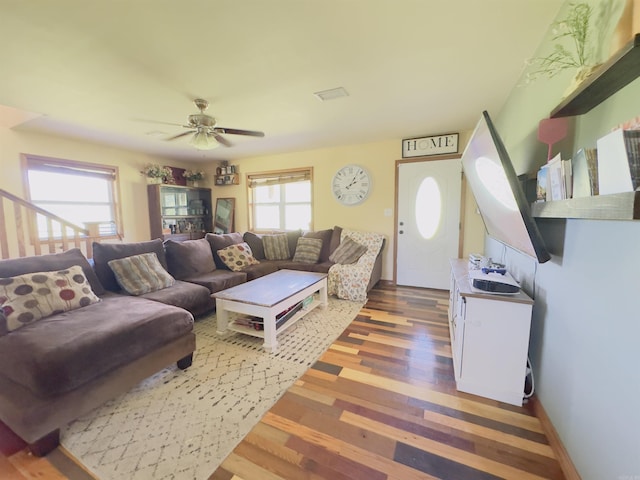 482 Ash Trl, Melbourne, AR 72556 - living area with ceiling fan, wood finished floors, and baseboards