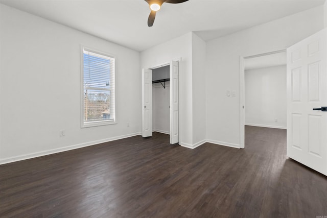 3113 W 11th, Little Rock, AR 72204 - unfurnished bedroom with dark wood-style flooring, baseboards, ceiling fan, and a closet