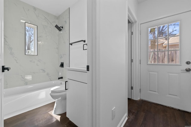 3113 W 11th, Little Rock, AR 72204 - bathroom featuring healthy amount of natural light, wood finished floors, and toilet