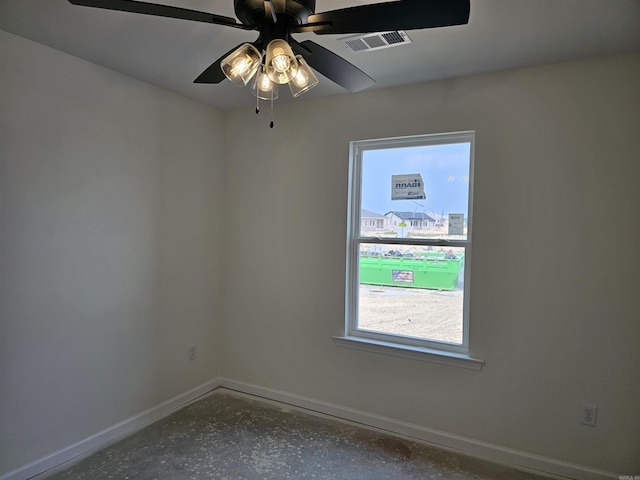 252 Kelton St, Hensley, AR 72065 - unfurnished room with baseboards and a ceiling fan