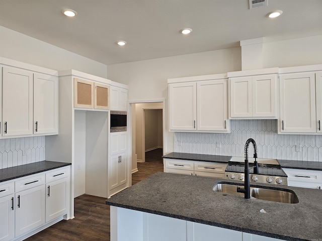 252 Kelton St, Hensley, AR 72065 - kitchen featuring a sink, white cabinetry, dark wood-style floors, and recessed lighting