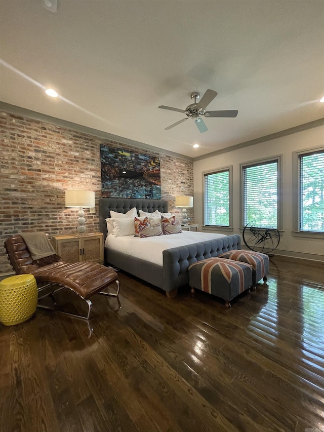 145 Cove Creek Ct, Little Rock, AR 72211 - bedroom with wood-type flooring, brick wall, crown molding, ceiling fan, and baseboards