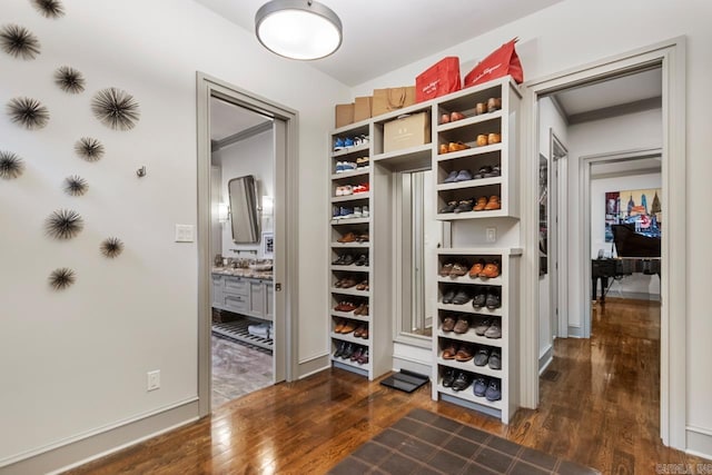 145 Cove Creek Ct, Little Rock, AR 72211 - walk in closet featuring dark wood finished floors