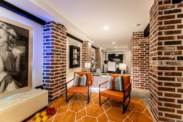 145 Cove Creek Ct, Little Rock, AR 72211 - hall with brick wall and recessed lighting