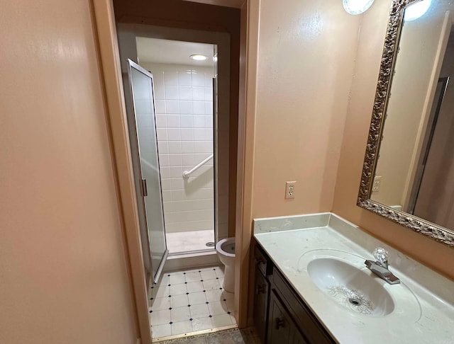 809 Emerald Gardens Dr, North Little Rock, AR 72118 - bathroom featuring toilet, a shower stall, and vanity