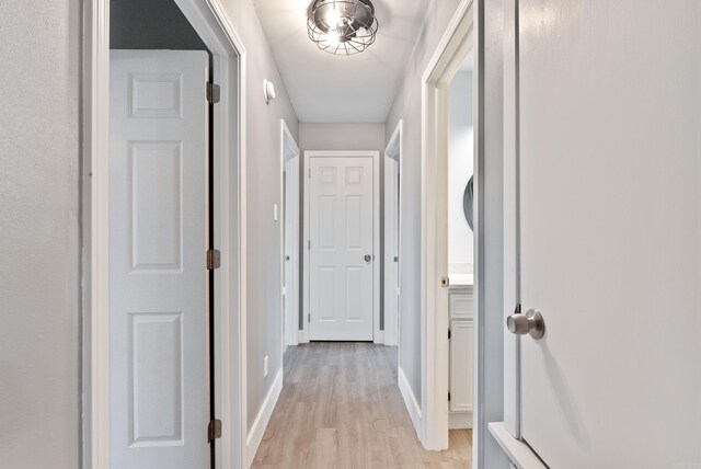 312 Eubanks Rd, Jacksonville, AR 72076 - hallway featuring light wood finished floors and baseboards