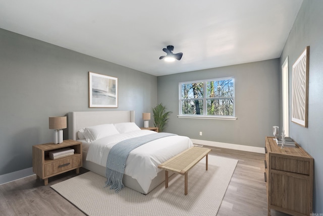 312 Eubanks Rd, Jacksonville, AR 72076 - bedroom with wood finished floors, baseboards, and ceiling fan