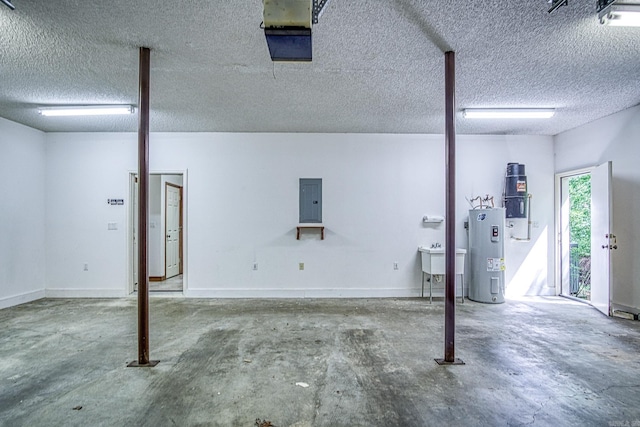 16 Zutano Ln, Hot Springs Village, AR 71909 - garage featuring electric water heater, electric panel, a garage door opener, and baseboards