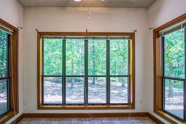 16 Zutano Ln, Hot Springs Village, AR 71909 - doorway with plenty of natural light, baseboards, and a ceiling fan