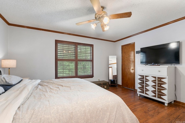 23 S Summit Dr, Cabot, AR 72023 - bedroom with dark wood-style floors, a textured ceiling, ornamental molding, and ceiling fan