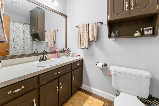 23 S Summit Dr, Cabot, AR 72023 - bathroom with toilet, baseboards, and vanity