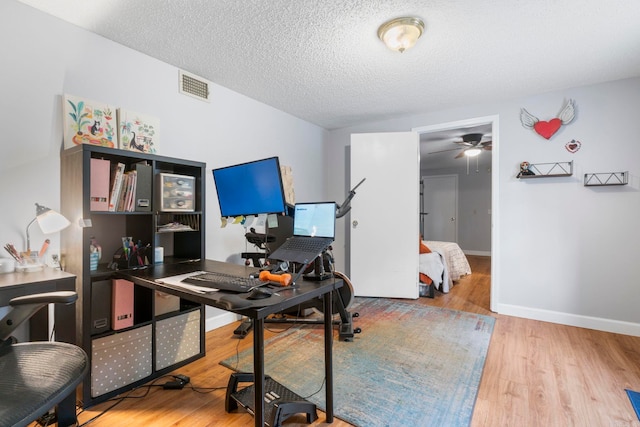 23 S Summit Dr, Cabot, AR 72023 - office area with wood finished floors, ceiling fan, a textured ceiling, and baseboards