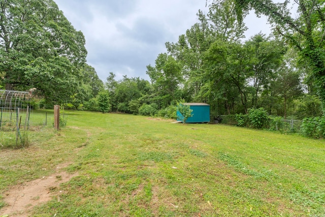 23 S Summit Dr, Cabot, AR 72023 - view of yard with a storage unit and an outdoor structure