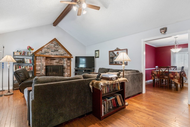23 S Summit Dr, Cabot, AR 72023 - living room with ceiling fan, light wood-type flooring, and a brick fireplace