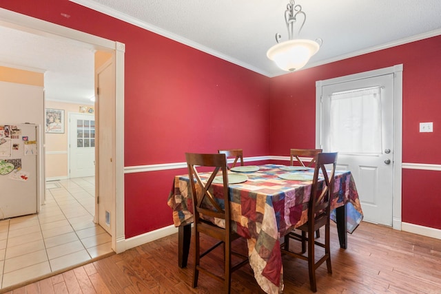 23 S Summit Dr, Cabot, AR 72023 - dining room featuring hardwood / wood-style flooring, baseboards, and crown molding