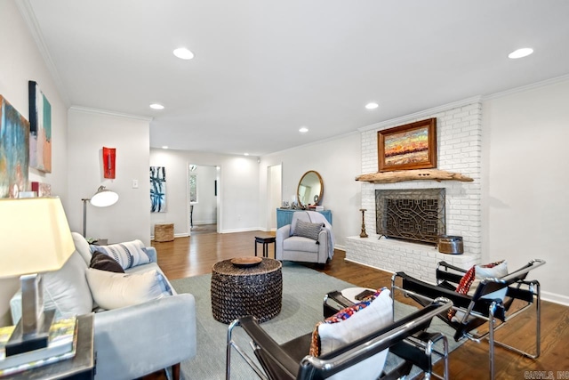 2820 N Rodney Parham Rd, Little Rock, AR 72212 - living area featuring ornamental molding, recessed lighting, wood finished floors, and a brick fireplace