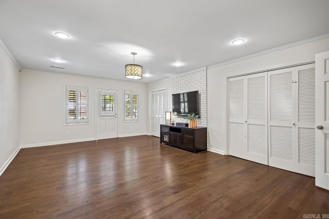 2820 N Rodney Parham Rd, Little Rock, AR 72212 - unfurnished living room with crown molding, dark wood-style floors, and recessed lighting