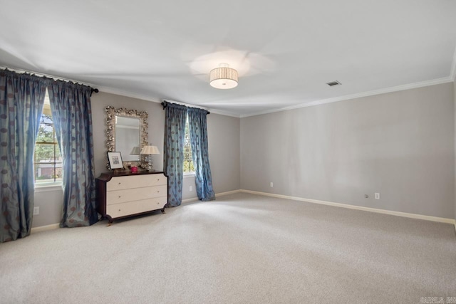 2820 N Rodney Parham Rd, Little Rock, AR 72212 - spare room with healthy amount of natural light, carpet, and crown molding
