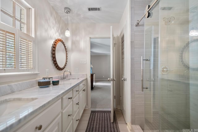 2820 N Rodney Parham Rd, Little Rock, AR 72212 - bathroom with double vanity and a stall shower