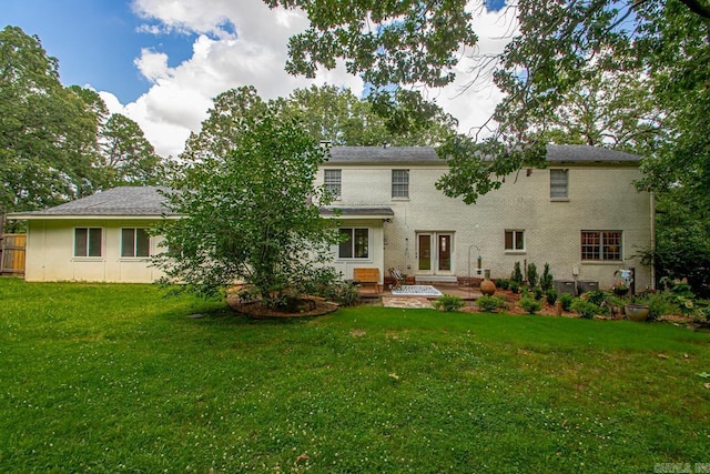 2820 N Rodney Parham Rd, Little Rock, AR 72212 - rear view of property with a lawn, a patio, french doors, and brick siding