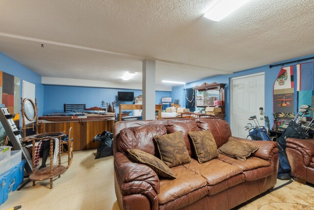 7104 Foxrun E End Dr, Mabelvale, AR 72103 - living area featuring a textured ceiling and light flooring