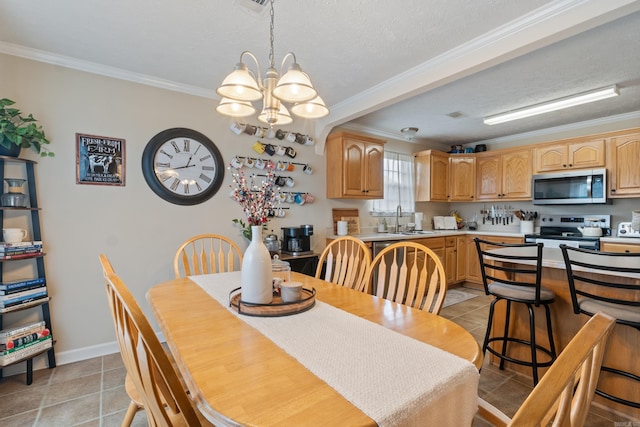 dining area featuring crown molding, a chandelier, light tile patterned floors, and a textured ceiling