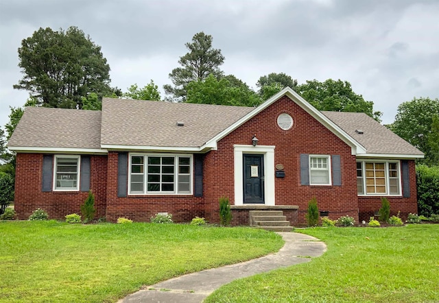 1400 Tulip Ave, Searcy, AR 72143 - view of front of home featuring brick siding, roof with shingles, and a front yard
