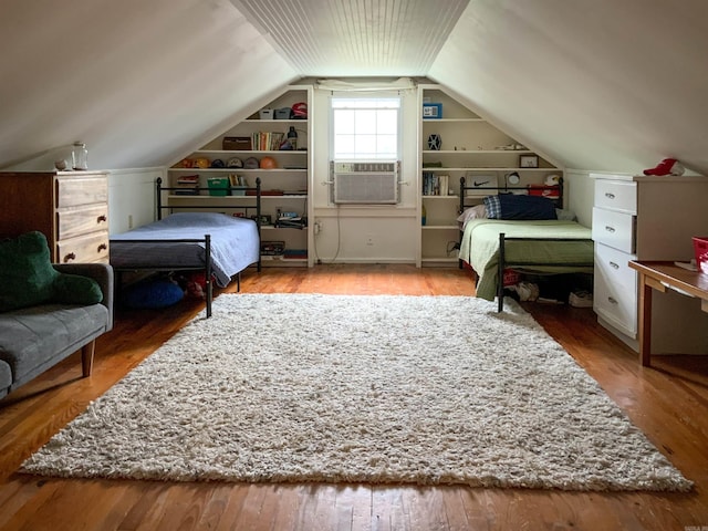 1400 Tulip Ave, Searcy, AR 72143 - bedroom featuring lofted ceiling, wood finished floors, and cooling unit
