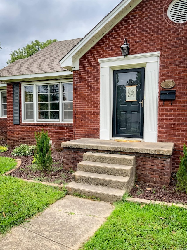 1400 Tulip Ave, Searcy, AR 72143 - property entrance with brick siding and a shingled roof