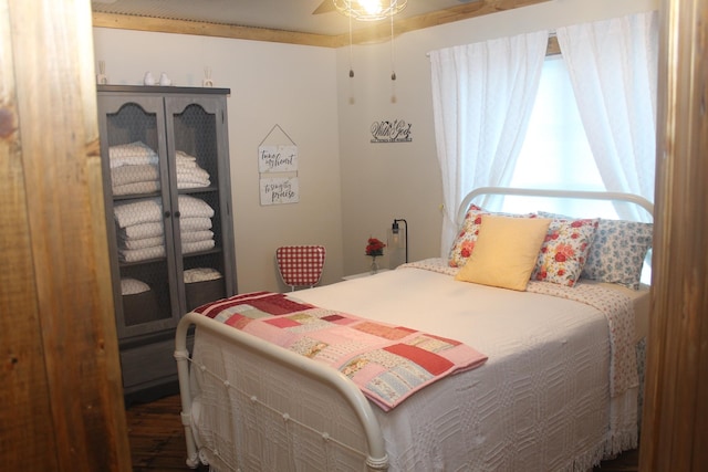 bedroom featuring wood finished floors
