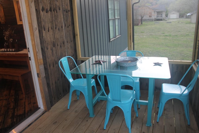 wooden deck with a lawn
