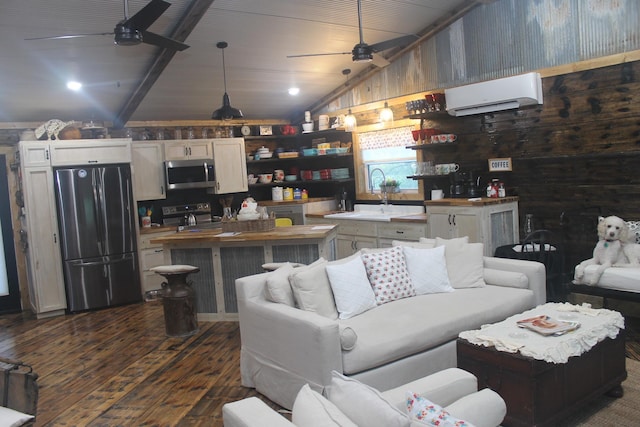 living area featuring a ceiling fan, a wall unit AC, vaulted ceiling, dark wood-type flooring, and wooden walls