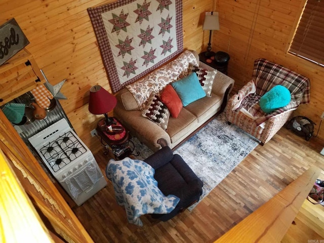 3227 Red Bluff Rd, Marshall, AR 72650 - living room featuring wood finished floors and wood walls