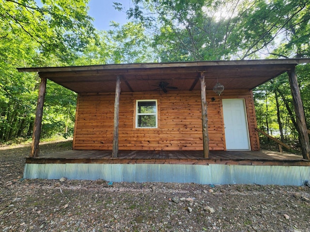 3227 Red Bluff Rd, Marshall, AR 72650 - view of property exterior featuring a ceiling fan and a deck