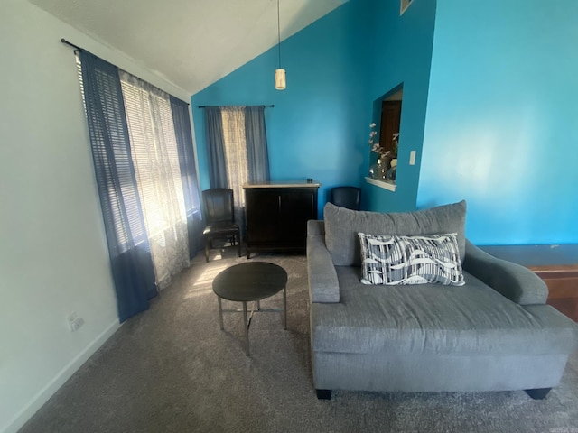 111 Dales Dr, Jacksonville, AR 72076 - living area featuring lofted ceiling, carpet flooring, and baseboards