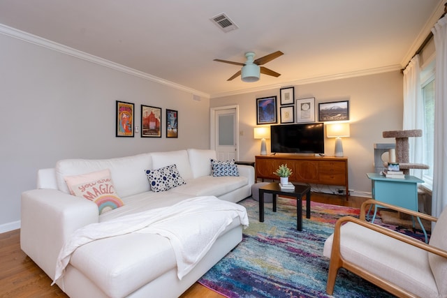375 Goshen Ave, North Little Rock, AR 72116 - living area with a ceiling fan, ornamental molding, wood finished floors, and baseboards