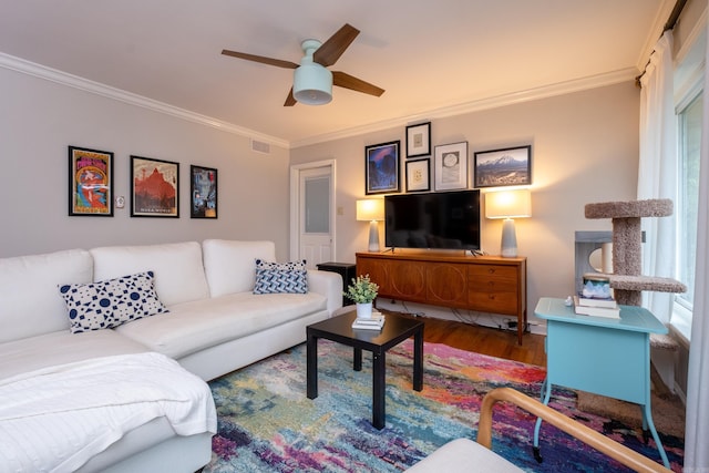 375 Goshen Ave, North Little Rock, AR 72116 - living area featuring crown molding, wood finished floors, and a ceiling fan