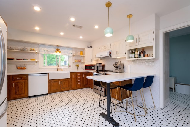 375 Goshen Ave, North Little Rock, AR 72116 - kitchen featuring dishwasher, open shelves, stainless steel electric range, a sink, and under cabinet range hood