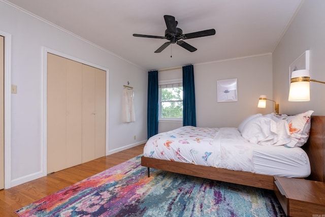375 Goshen Ave, North Little Rock, AR 72116 - bedroom featuring wood finished floors, ornamental molding, ceiling fan, and baseboards
