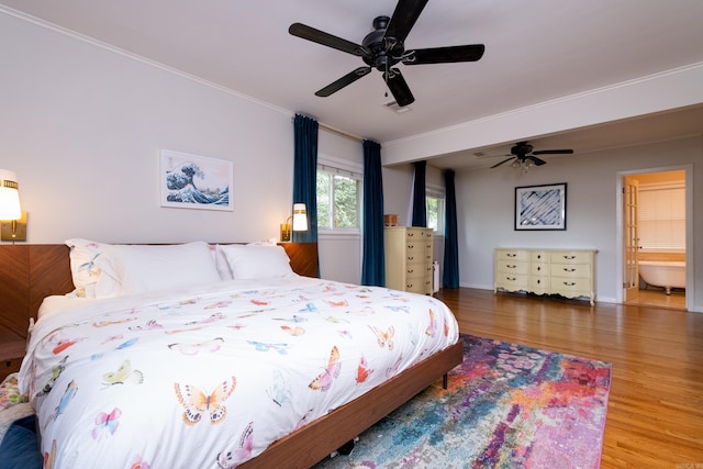 375 Goshen Ave, North Little Rock, AR 72116 - bedroom with wood finished floors, ceiling fan, crown molding, and ensuite bath