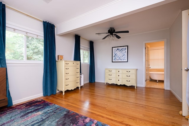 375 Goshen Ave, North Little Rock, AR 72116 - bedroom with light wood-style floors, baseboards, ensuite bath, ornamental molding, and ceiling fan