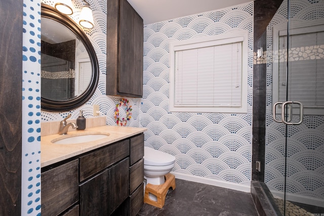 375 Goshen Ave, North Little Rock, AR 72116 - full bathroom with a stall shower, toilet, wallpapered walls, vanity, and baseboards